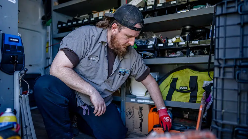 Blind & Sons service vehicle in a parking lot