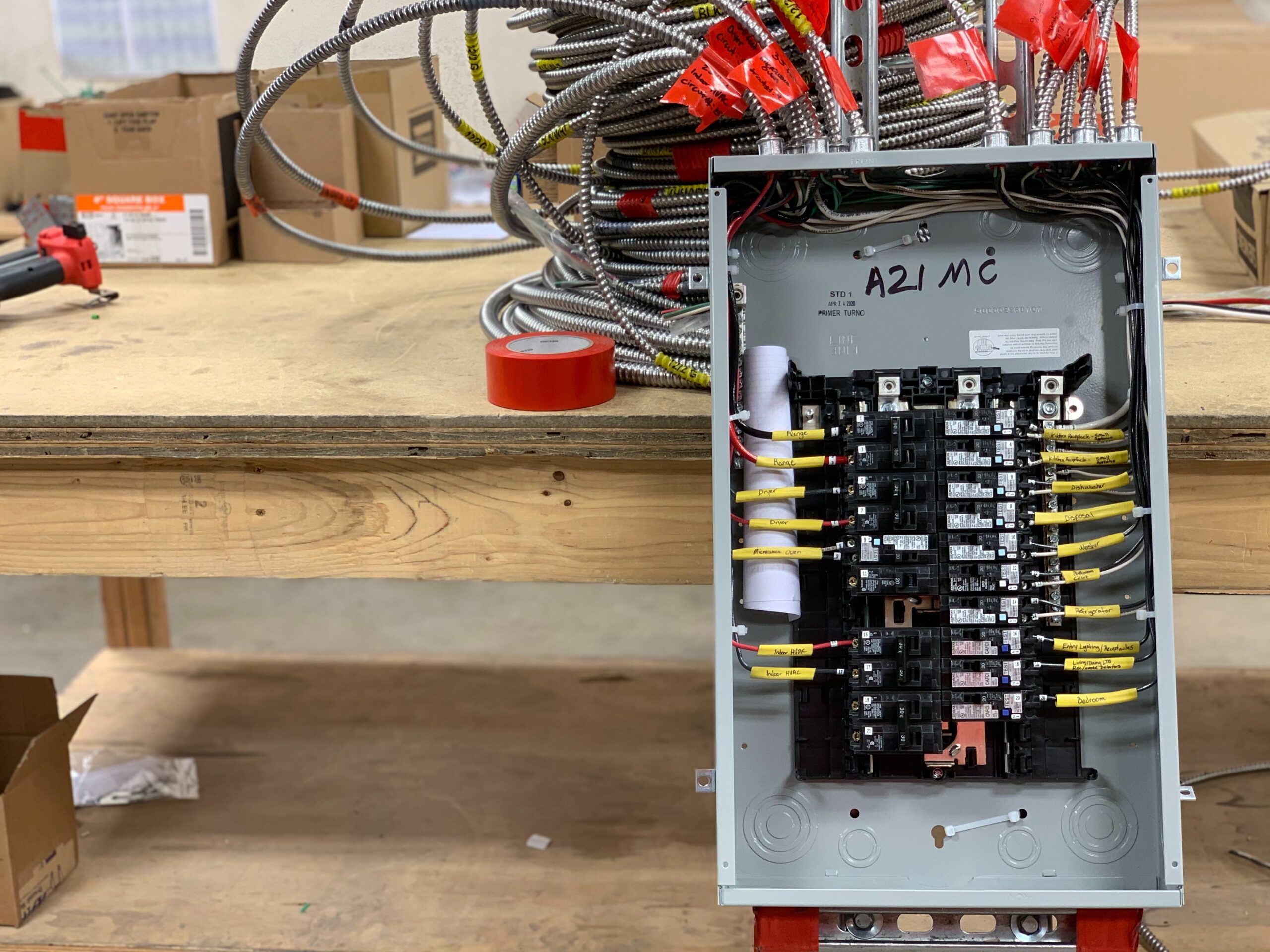open electrical panel with circuit breakers visible